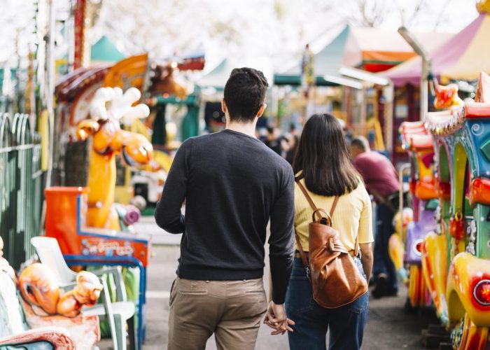 couple-having-walk-theme-park